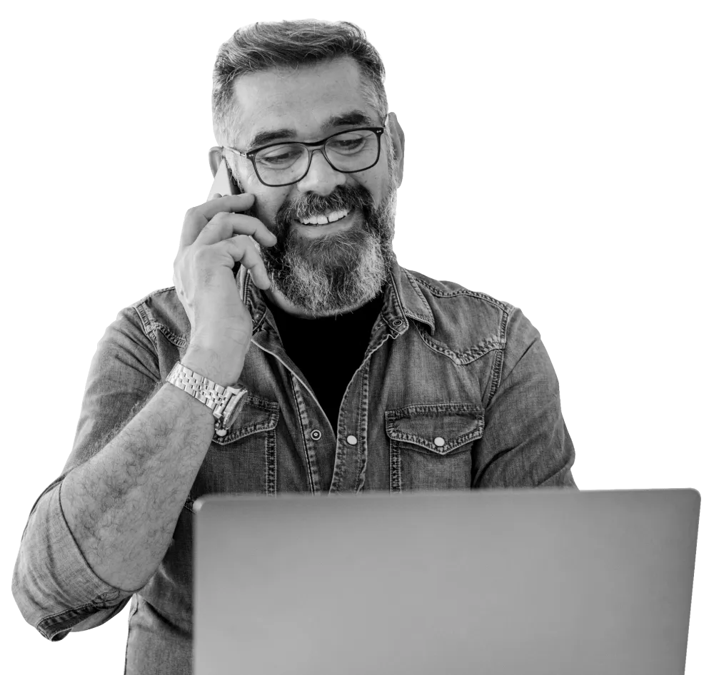 Man in denim shirt on laptop