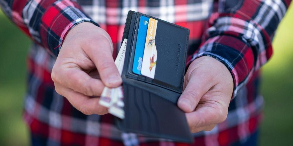 Man holding wallet in hands